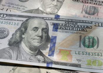 Greenback attempts to claw back losses after solid manufacturing data