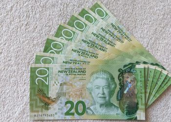 New Zealand dollar tips lower as USD rallies on taper talk