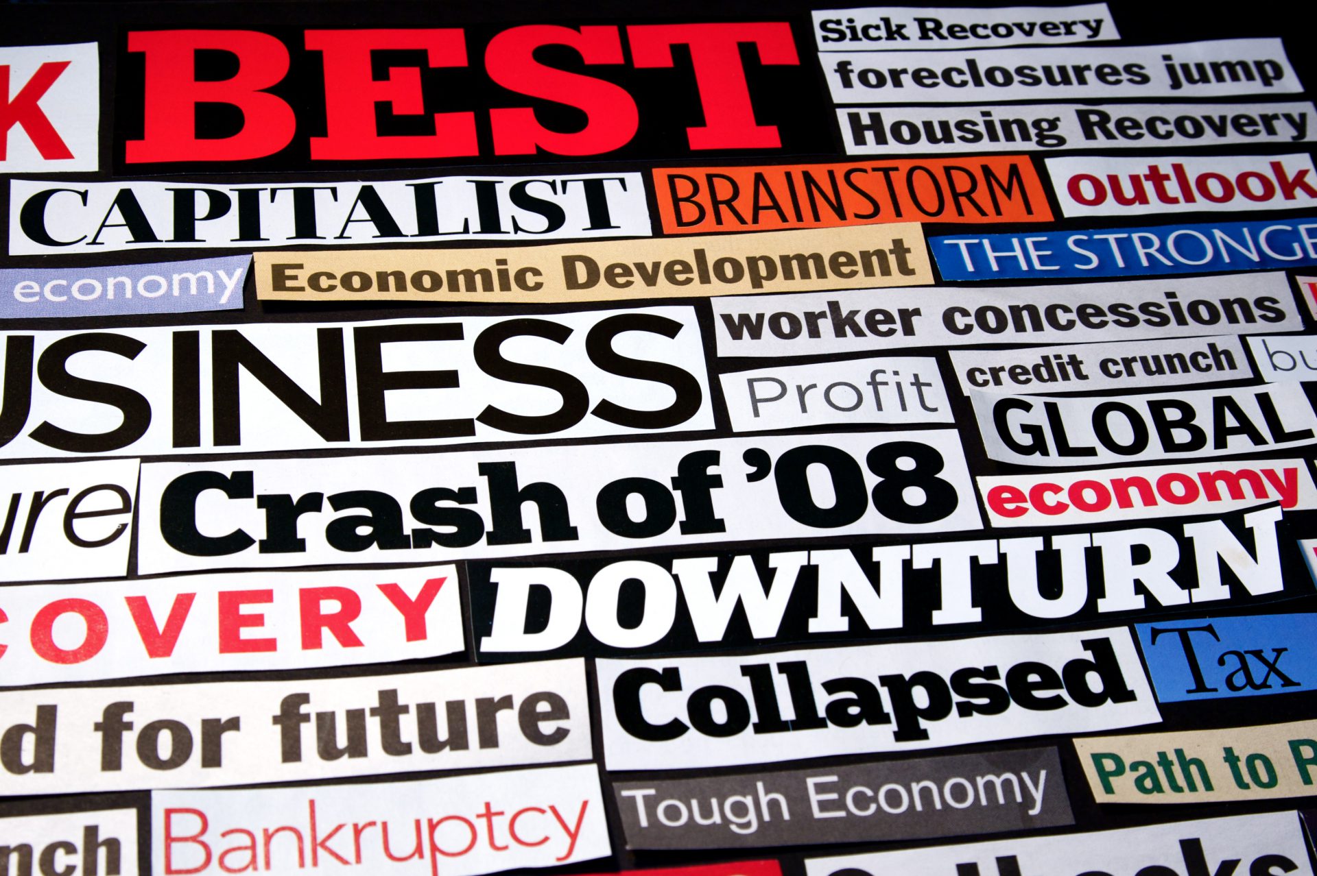 Newspaper and magazine headlines detailing the economic recession and recovery