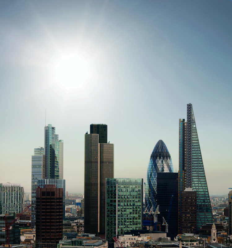 The City of London financial district with sun