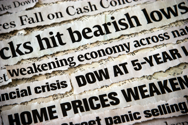 Economic headlines surrounding each other