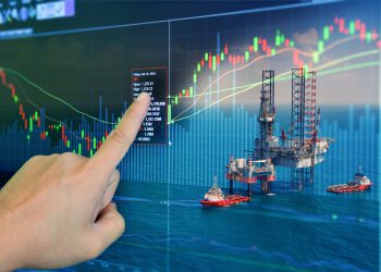 Stock market concept with oil rig in the gulf