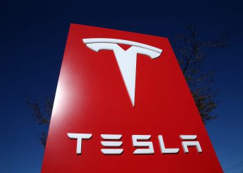 PALO ALTO, CA - NOVEMBER 05: A sign is posted at a Tesla showroom on November 5, 2013 in Palo Alto, California. Tesla will report third quarter earnings today after the closing bell. (Photo by Justin Sullivan/Getty Images)