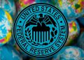 United States Federal Reserve System symbol (FED) on the globe background, business and financial concept
