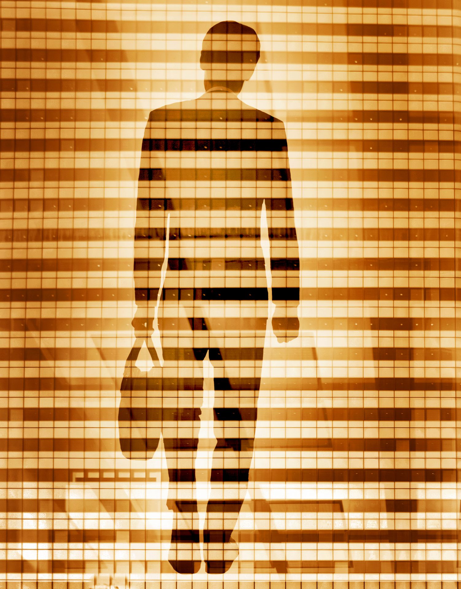 Single silhouette businessman in composite with office tower windows.