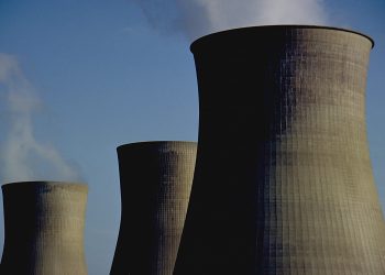 These are the iconic cooling towers of a nuclear power plant. these oversized smoke stacks vent steam form the Power plant