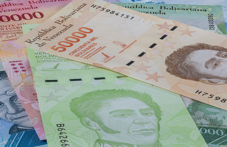 Close up to the currency of the south American country Venezuela. High inflation and weak economy increases the denomination of the banknotes. Bolivares or Bolivar money of the republic Venezuela