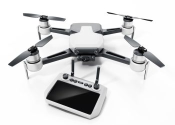 Drone and remote controller with large screen isolated on white.