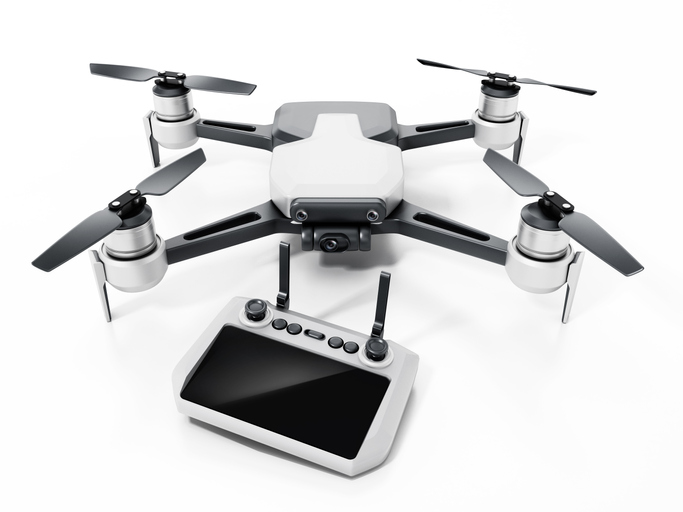 Drone and remote controller with large screen isolated on white.