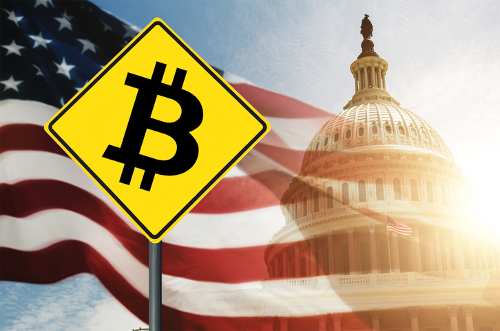 bitcoin street sign against us capitol hill