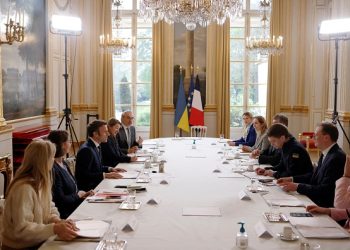 French President Emmanuel Macron (3rdL) meets with Melitopol City Mayor Ivan Fedorov (3rdR) from Ukraine at the Elysee Palace in Paris, on April 1, 2022. - On 11 March 2022, Ivan Fedorov was detained and questioned for 5 days by Russian army amid the conflict in Ukraine. (Photo by Yoan VALAT / POOL / AFP) (Photo by YOAN VALAT/POOL/AFP via Getty Images)