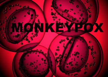 Monkey pox - word with cells or molecules of the virus macro on a dark red background. 3D render.