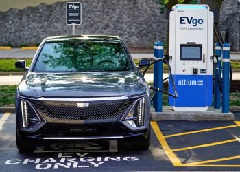 A Cadillac LYRIQ is plugged into an EVgo DC fast charging stall. (Photo by Nuccio DiNuzzo for General Motors)