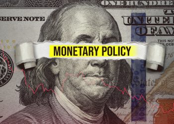 Torn bills revealing Monetary Policy words. Ideas for Increase or Decrease interest rates, Stimulate the economy, Moneyless valuable