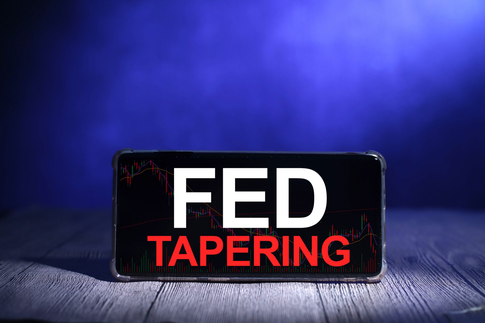 Taper Tantrum concept, global economic world market reacting to the Fed Tapering Off. Word text typography