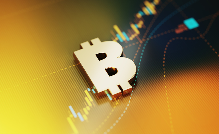 Gold colored Bitcoin symbol sitting on yellow financial graph background. Horizontal composition with selective focus and copy space. Investment, stock market data and finance concept.