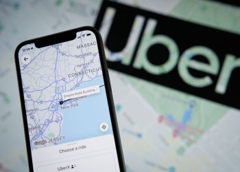 The Uber app application with a map of New York City is seen on an Apple iPhone mobile phone in this photo illustration Warsaw, Poland on 21 September, 2022. (Photo by STR/NurPhoto via Getty Images)