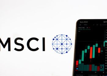 UKRAINE - 2021/04/02: In this photo illustration, the stock market information of MSCI Inc. seen displayed on a smartphone with the MSCI Inc. logo in the background. (Photo Illustration by Igor Golovniov/SOPA Images/LightRocket via Getty Images)