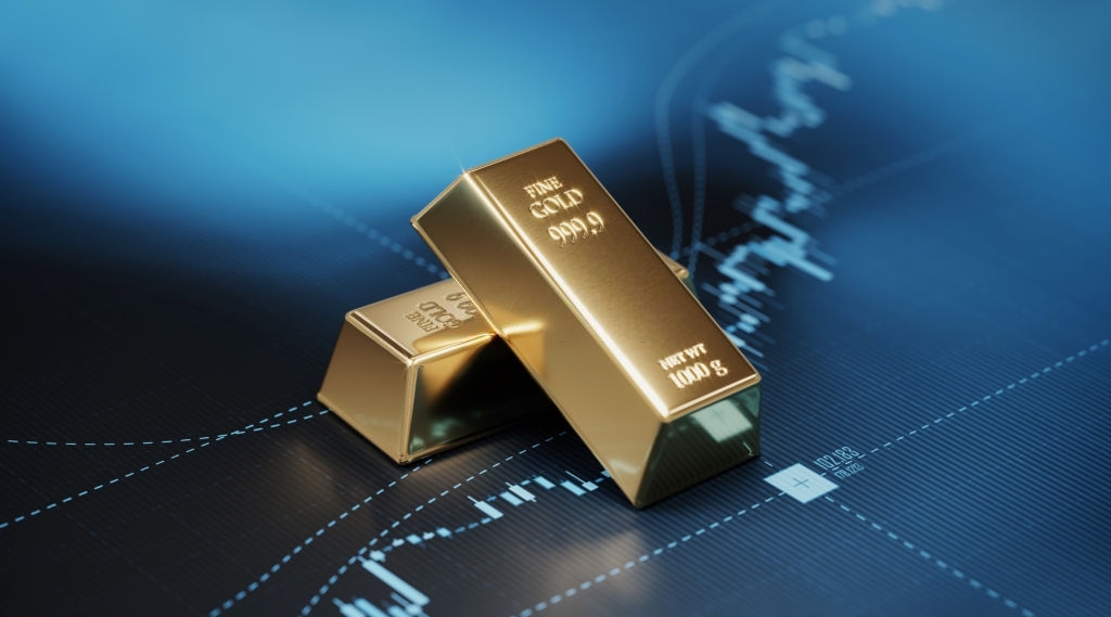 Gold bars sitting on blue bar graph. Selective focus. Horizontal composition with copy space. Stock market and finance concept.