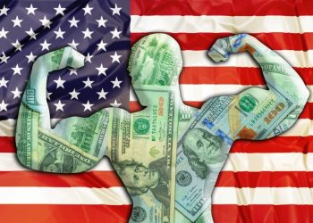 Abstract business background. Concept of powerful United States American Dollar. United States Flag and bodybuilder shaped USD currency. Financial concept about exchange rate of American dollars.