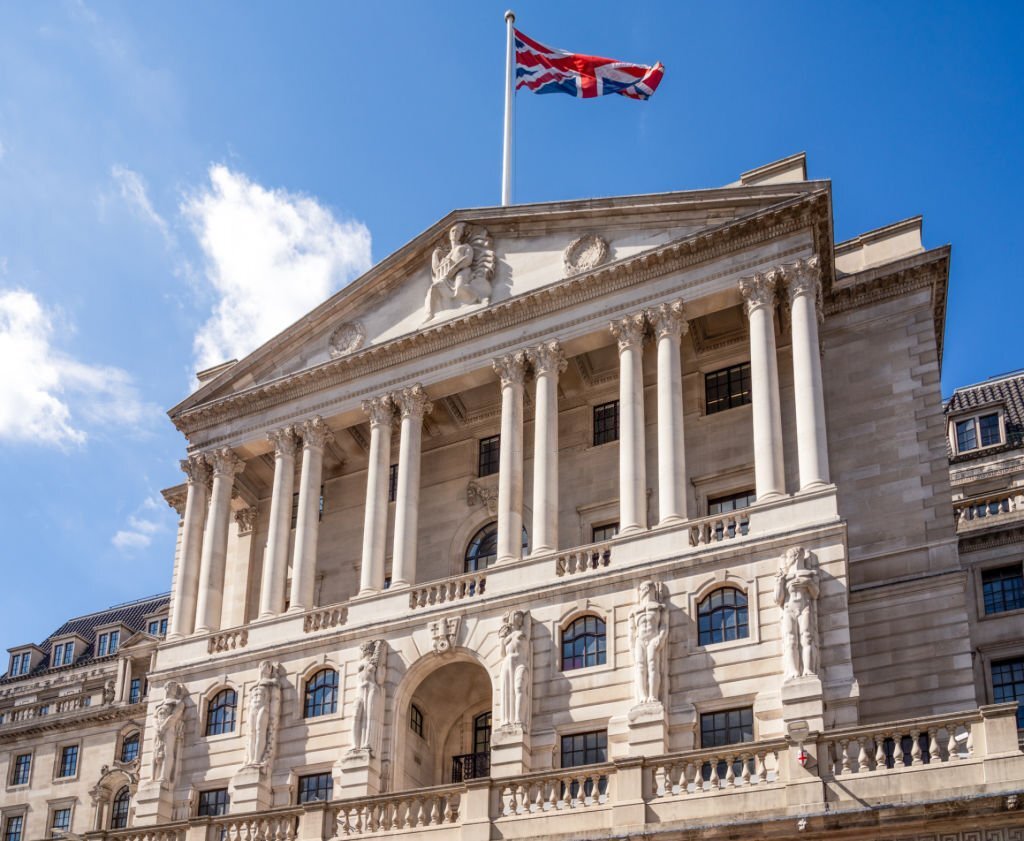 A Union flag flying over the Bank of England, the central bank of the United Kingdom, located on Threadneedle Street in the City of London.
