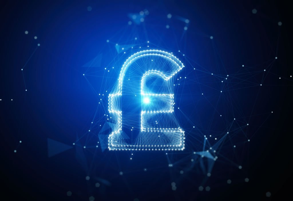 Digital British Pound symbol over blue technological background. Horizontal composition with copy space. Blockchain, cryptocurrency, global finance and business concept.
