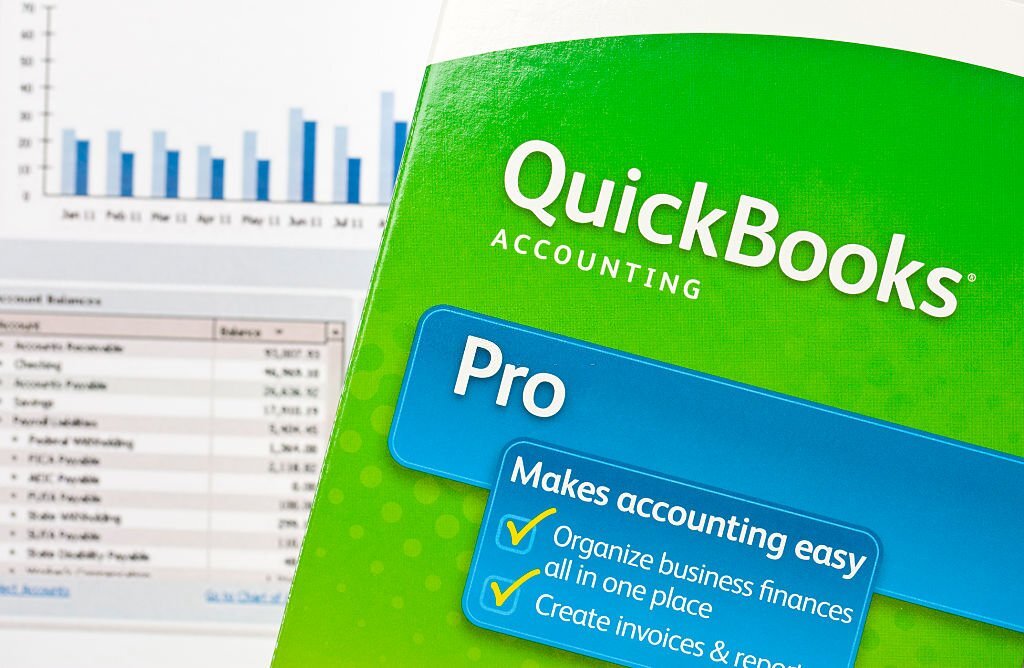 San Marcos, USA - July 5, 2011: QuickBooks box on graphs. Quickbooks is an accounting software program created by INTUIT corporation. It is the most popular accounting software program for small business with over 90% market share.